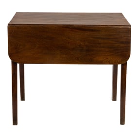 An English mahogany pembroke table, circa 1860, the top with D drops flanking the single drawer, and