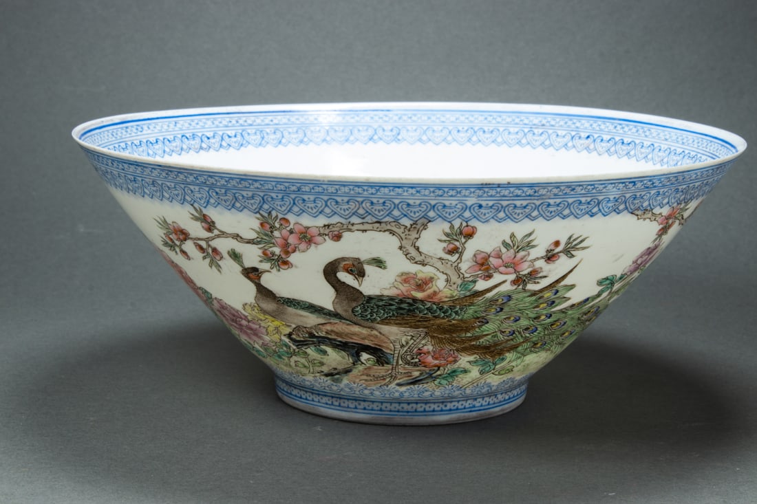 Chinese eggshell porcelain bowl: Chinese eggshell porcelain bowl. Decorated with flower, bird, and butterfly, 7.5" wide.