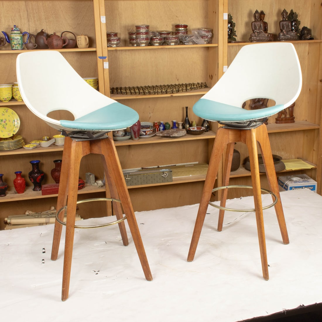 A pair of Mid Century molded plastic swivel stools (1 of 1)
