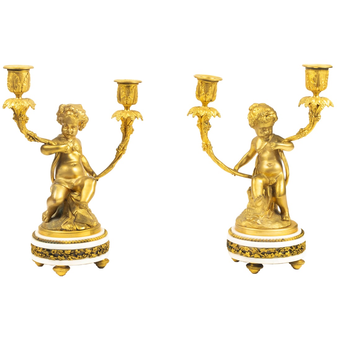 A pair of Louis XV style gilt bronze figural two-light candelabra of infant satyrs after Clodion (1 of 2)