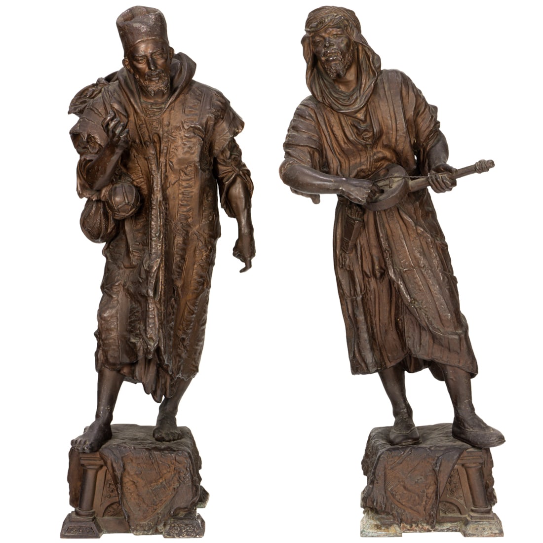 A pair of Continental patinated metal figures of North African men: A pair of Continental patinated metal figures of North African men, late 19th century, one modeled as a musician, each raised on fabric draped plinth, unmarked, 31"h. Provenance: Property from the pri
