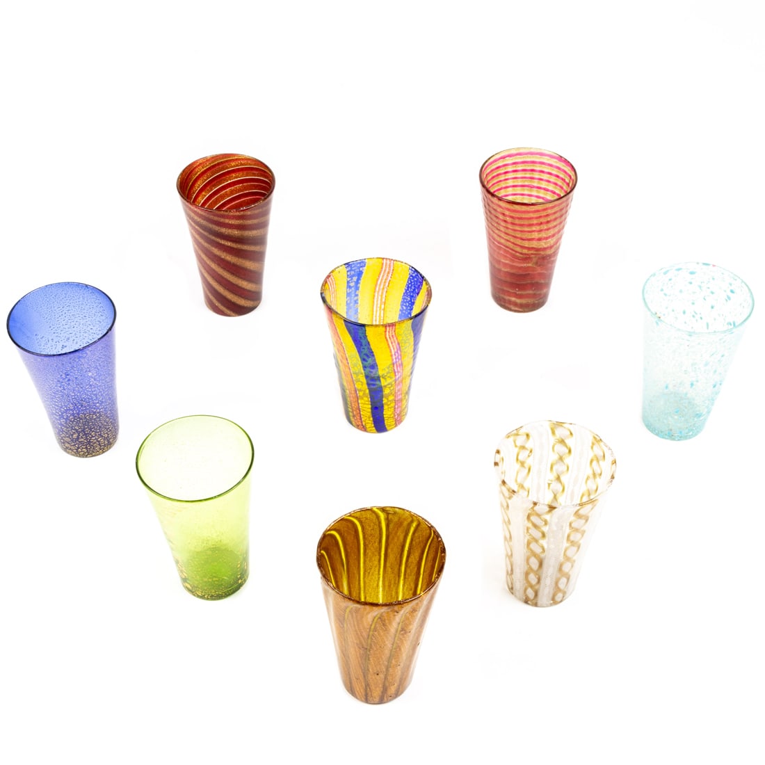 Eight Murano glass tumblers: Eight Murano glass tumblers, variously decorated with latticino, aventurine and swirl designs, unmarked, greatest 3.5"h