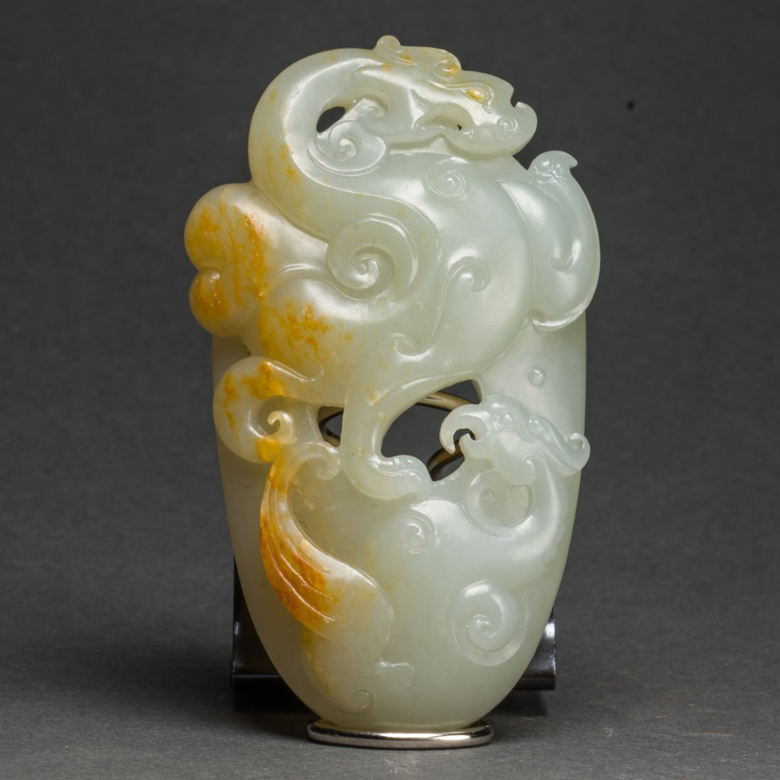 Chinese russet and celadon jade 'dragon and phoenix' pendant: Chinese russet and celadon jade 'dragon and phoenix' pendant. 2.75" across.