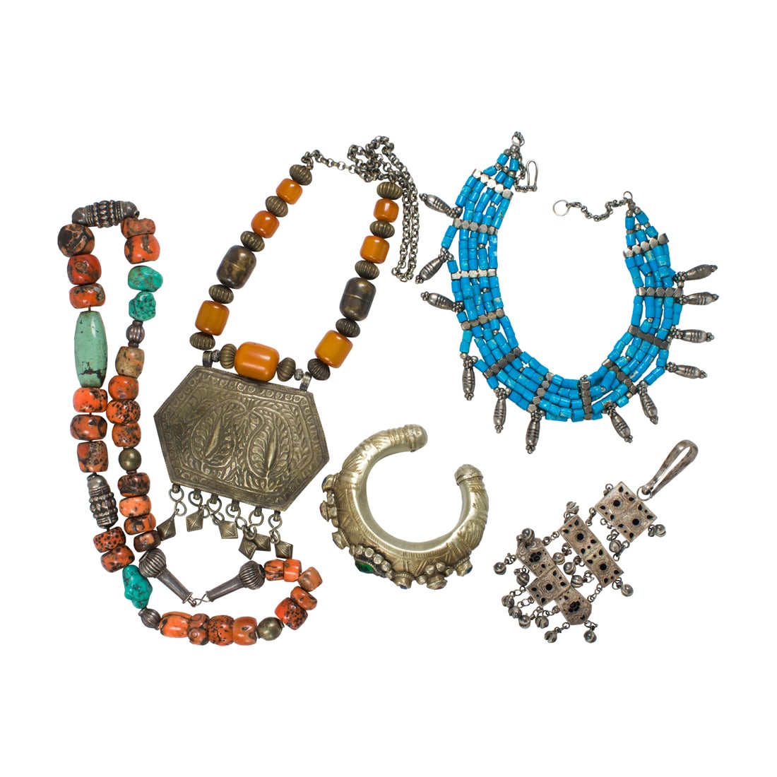 A group of silver and bead jewelry: A group of silver and bead jewelry comprising, three necklaces, one bangle, and one pendant; 550.00 gross grams