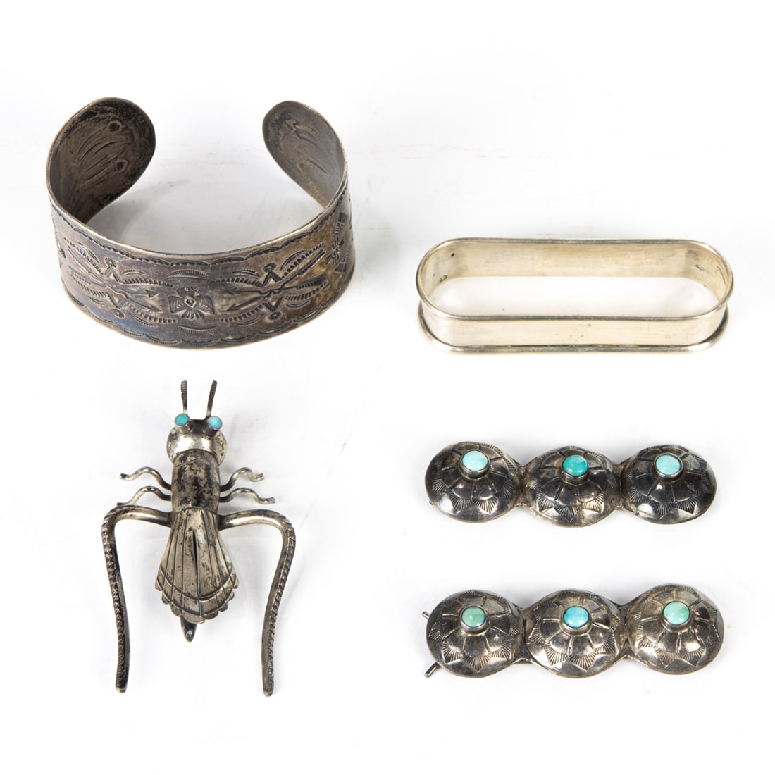 A lot of Native American silver jewelry, including a cuff bracelet, pair of barrettes and insect (1 of 1)