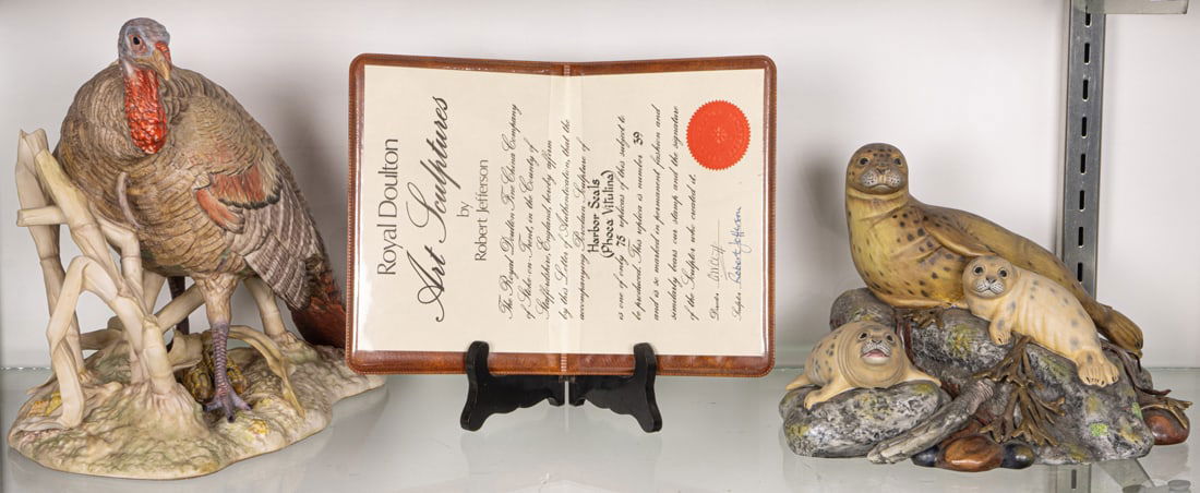 Two porcelain figures of animals: a Royal Doulton Harbor Seals HN 3507; and a Cybis American Wild (1 of 1)