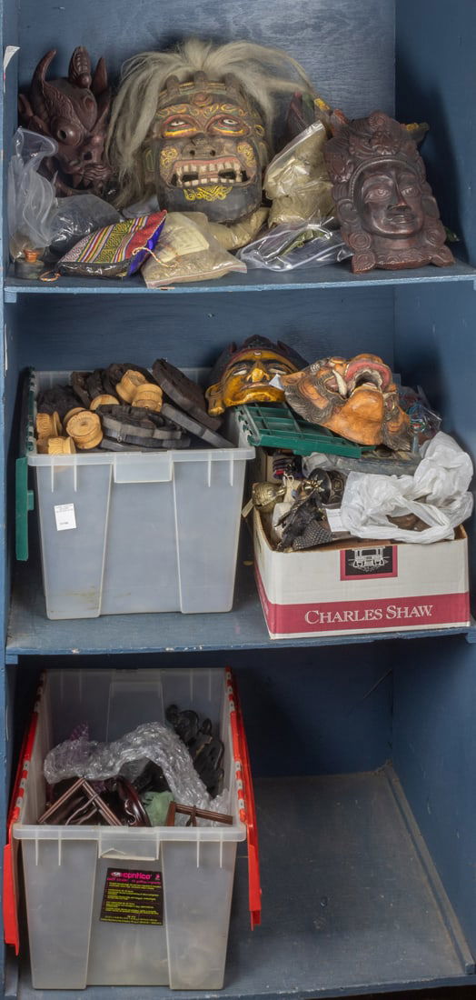 Three bins of Tibetan decorative objects: Three bins of Tibetan decorative objects.