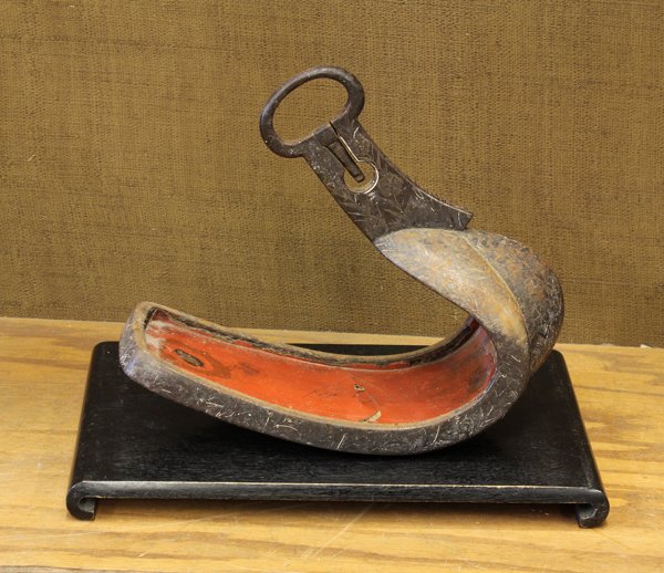 Japanese Inlaid Iron Stirrup, Abumi: Japanese inlay decorated iron horse stirrup (abumi), Edo period, the lobed front exterior featuring a field of flowering nadeshiko accented by long leafy sprigs, in contrast with the red lacquered int