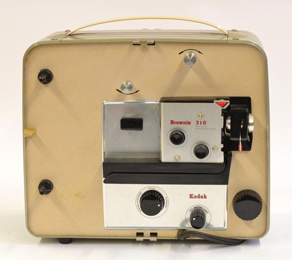 Kodak Movie Projector: Kodak movie projector in original box, circa 1955, brownie 310 model, enclosed in a metal carrying case