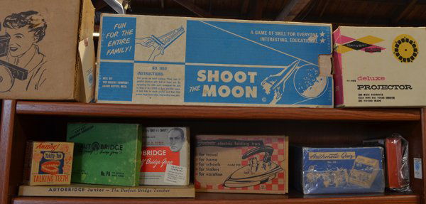 Vintage games: (lot of 13) Vintage games including Tom Thumb Register, Mechanical Mixer, Gilbert Microscope, Improved Powelite Junior ''Portable Sunshine'', Shoot the Moon, Sawyer's View Master deluxe projector, Fos