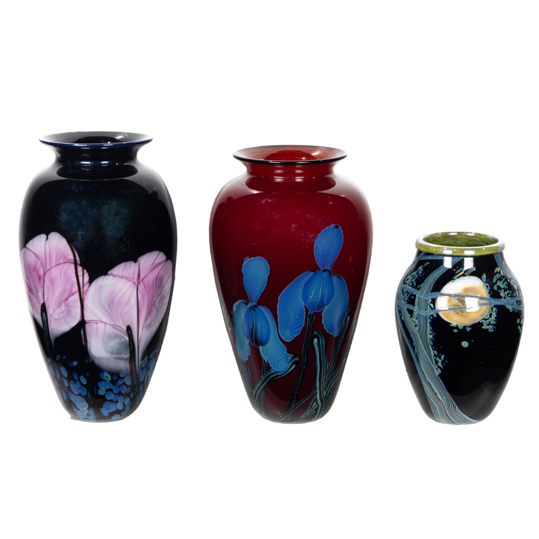 Three Richard Satava glass vases: Three Richard Satava glass vases, dated 1983 and 1986, decorated with flowers and tree branches, each with engraved signature and date, greatest 9.5"h