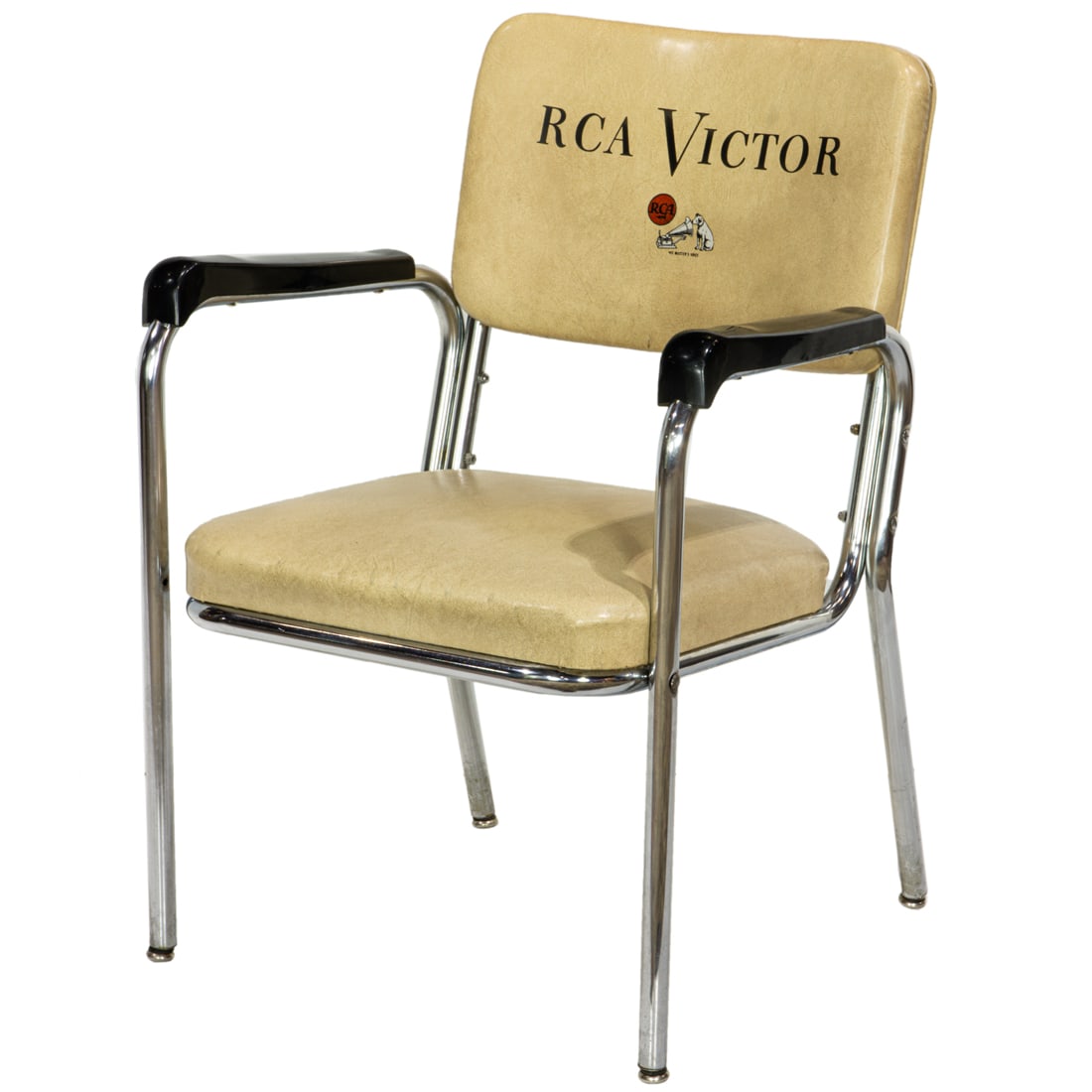 A Chromcraft armchair upholstered in vinyl with decaled 'RCA Victor' logo and dog,: A Chromcraft armchair upholstered in vinyl with decaled 'RCA Victor' logo and dog, 32"h x 22"w x 26"d. Note: It is thought that these chairs were made for RCA distributors at their showrooms. Provenan