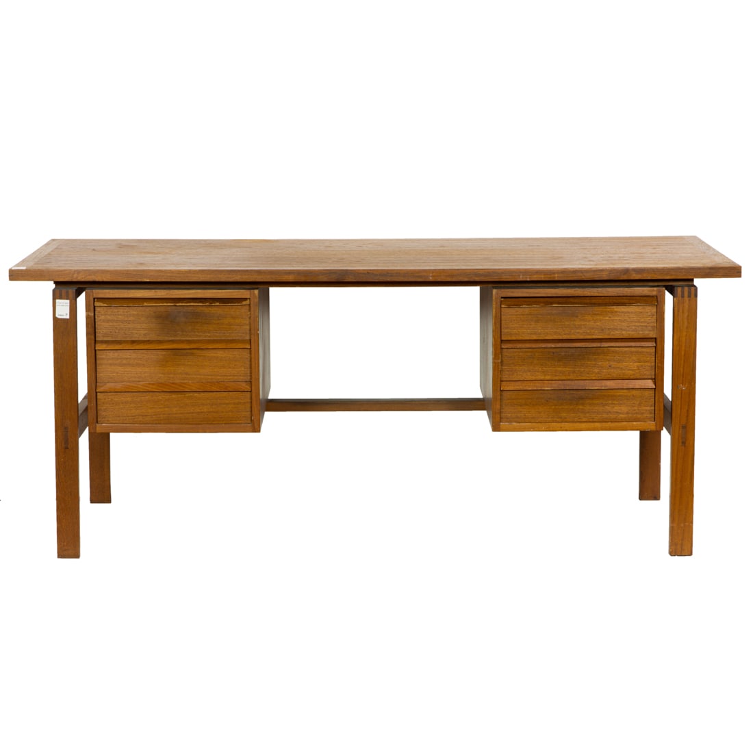 A Danish Svend Madsen teak executive desk: A teak Danish Svend Madsen executive desk, with a file drawer and three drawers, file drawer with Danish Control mark, overall 28"h x 69"w x 30.5"d