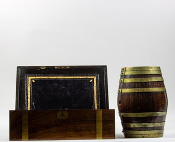 An English brass bound mahogany lap desk and a miniature madeira barrel