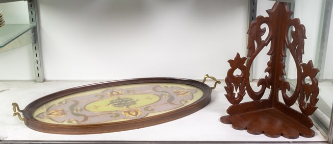 A Black Forest carved wall bracket and an Art Nouveau style glass inlaid tray