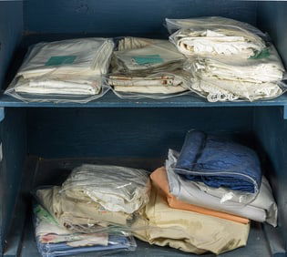 A collection of fine linens and textiles