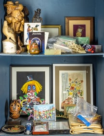 An assembled group of decorative table articles and framed pictures