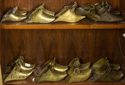 A group of sixteen Spanish Colonial brass stirrups