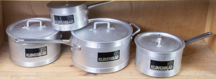 A set of four Danish Kloverblad aluminum covered pots and saucepans