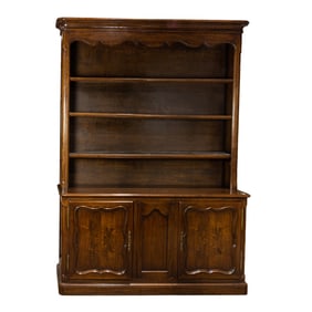 A Louis XV style mahogany breakfront bookcase cabinet