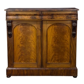 A Renaissance Revival flame mahogany veneered sideboard