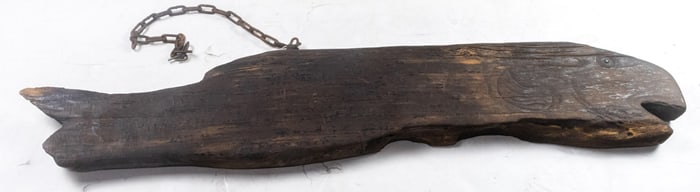 A vintage wood fishmonger's sign carved in the form of a fish