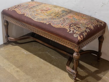 A Louis XIV style needle and petit point stool featuring a King and a Queen