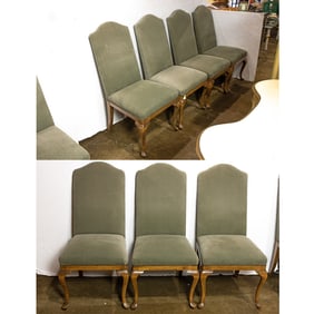 A set of six Georgian style camel back dining chairs