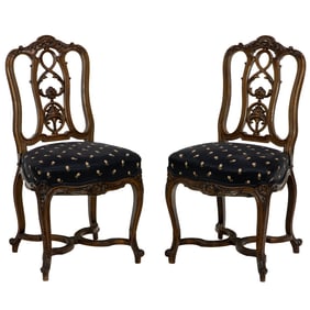 A pair of French Rococo style side chairs