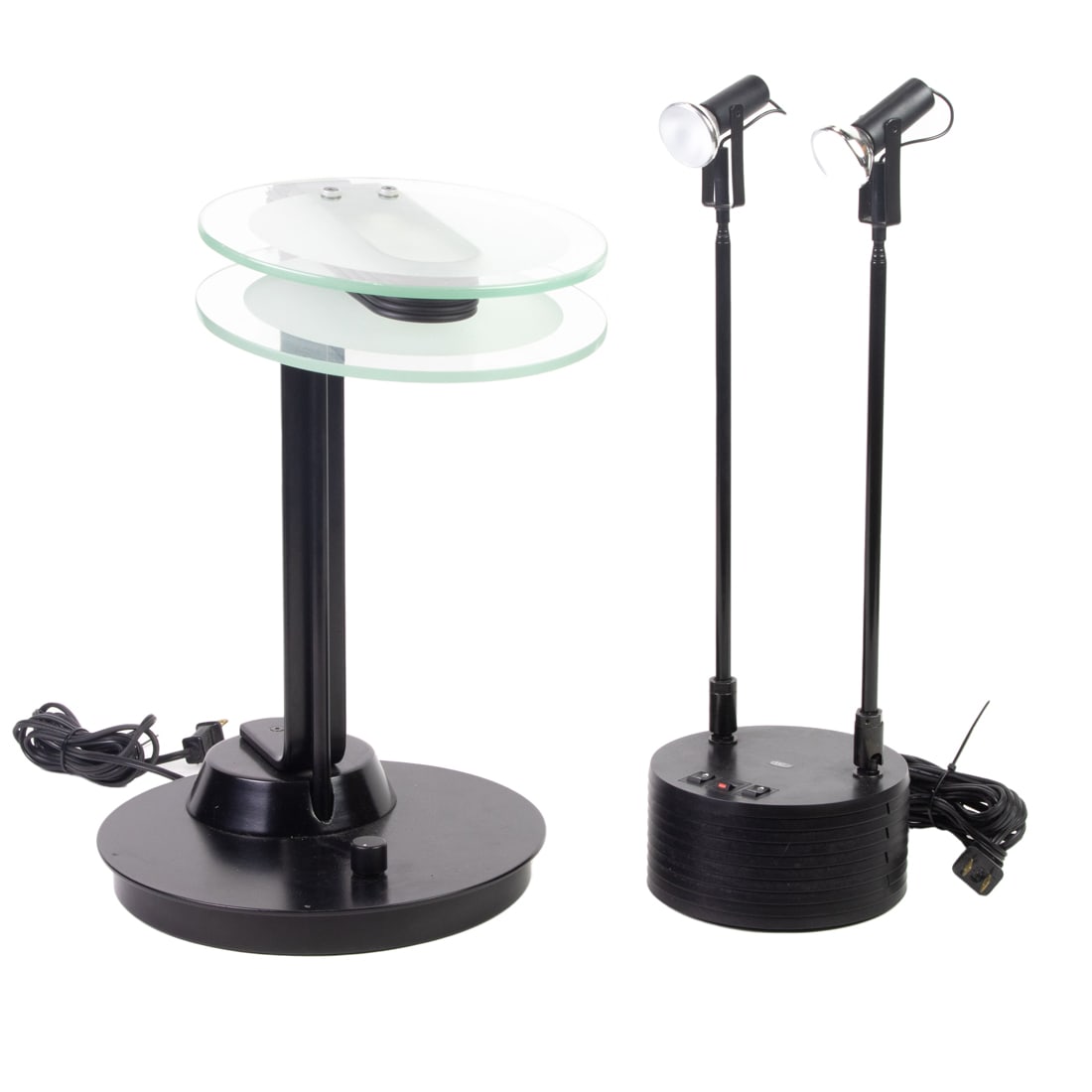 Two Modern black table lamps: Two Modern black table lamps, the first Hans Amsems for Luxo Sciopticon two-light adjustable desk lamp, 17"h (closed) and another desk lamp with double glass panel shade, greatest 15.5"h