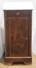 A Napoleon III marble top mahogany cabinet consisting of a singler drawer