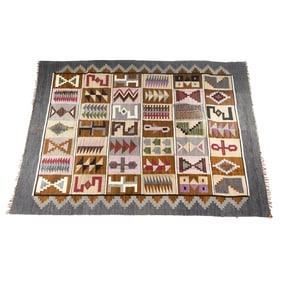 A flatweave Navajo style carpet