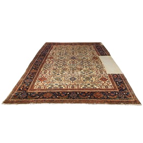 A Sultanabad carpet, 11'9" x 17'2" (Please note: patches)