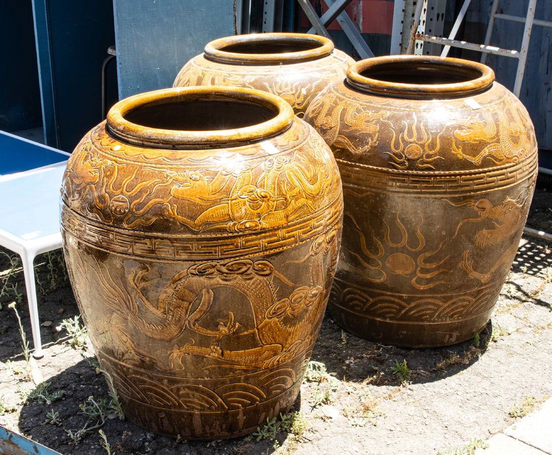 A suite of three massive Chinese brown glazed pottery jardinieres (1 of 1)