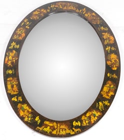 A Chinoiserie shell inlaid lacquered oval mirror with beveled mirror plate