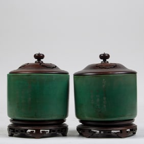 Pair of Chinese celadon vases with wood covers and stands