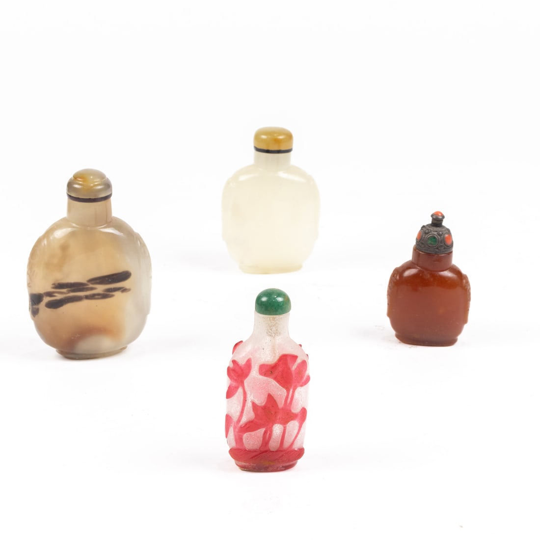 (lot of 4) Chinese glass snuff bottles: (lot of 4) Chinese glass snuff bottles. From 1.75" to 3" high.
