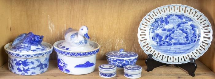 Shelf of Chinese blue and white porcelain articles