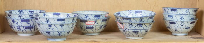 Shelf of Chinese blue and white bowls