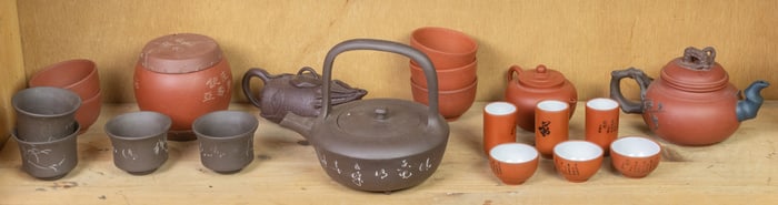 Group of Chinese Yixing teapots and cups