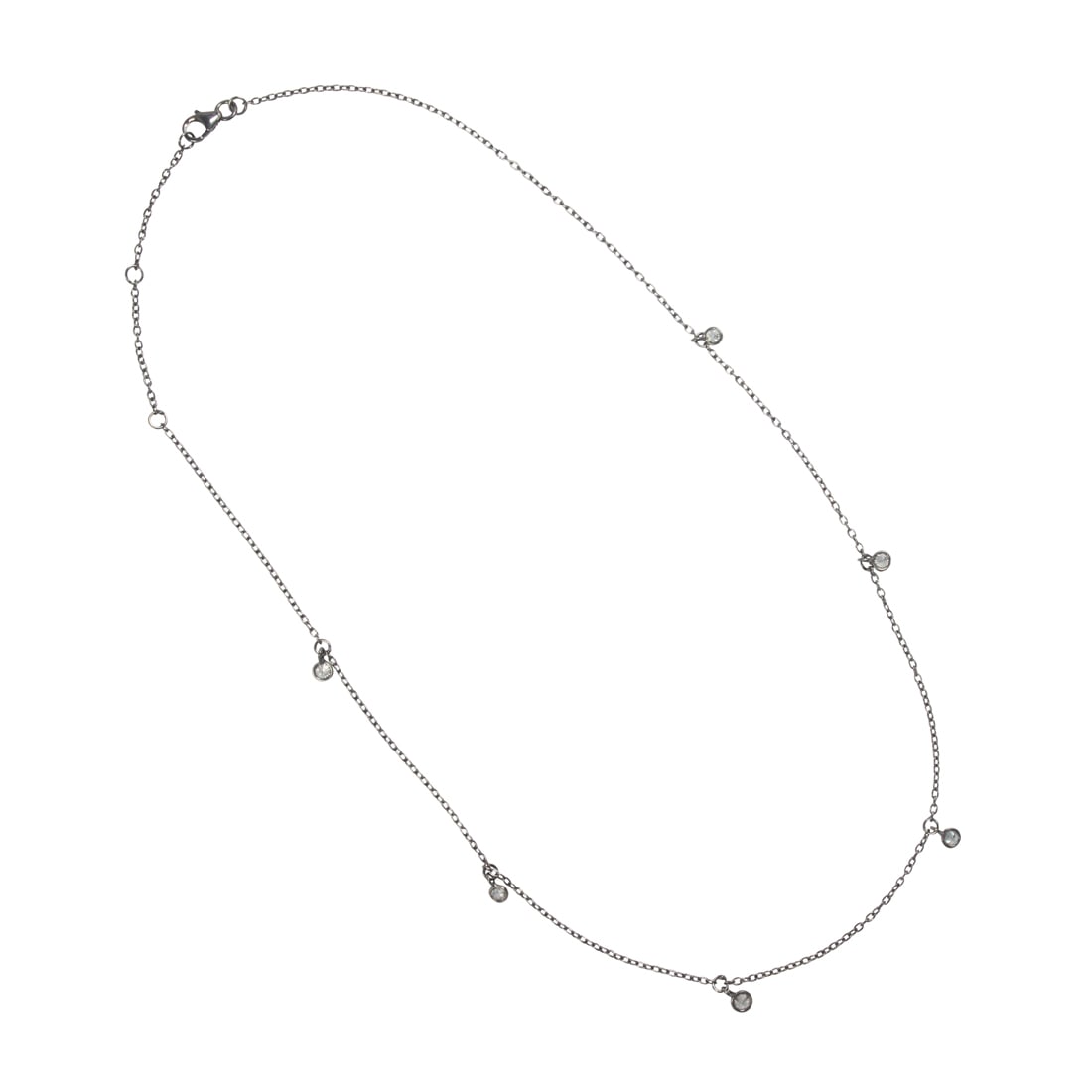 A diamond and blackened silver necklace: A diamond and blackened silver necklace the fine link chain suspending six round brilliant-cut diamond drops; estimated total diamond weight: 0.60 carat; 2.7 grams; 18 1/2 in