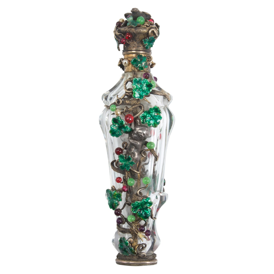 An antique enamel and silver perfume bottle: An antique enamel and silver perfume bottle the faceted rock crystal flask decorated with silver vines, bird and putti, accented with green enamel leaves, glass 'berries' and costume pearls; with Fren