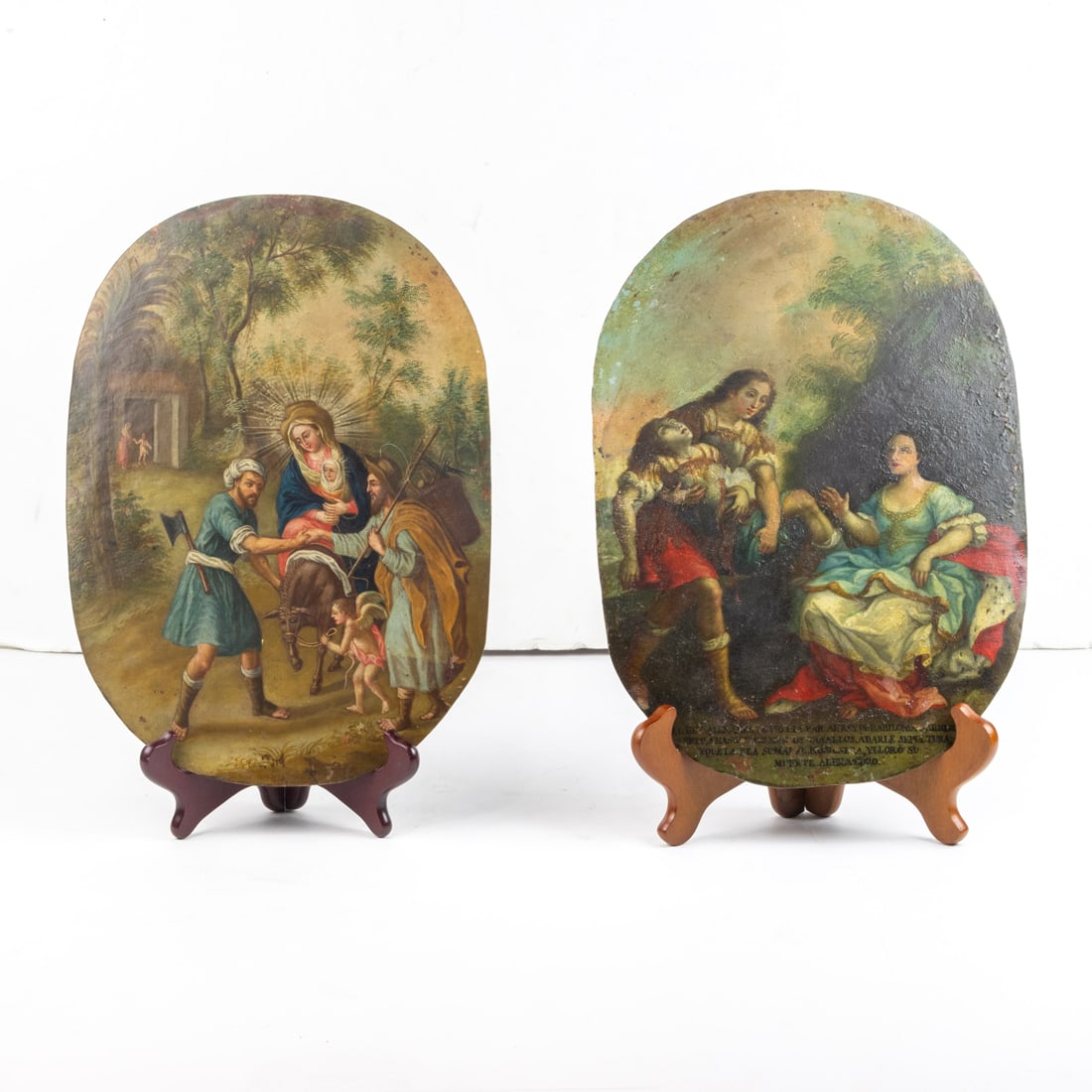 Pair of Spanish Colonial double sided retablos second half 18th century: Pair of Spanish Colonial double sided retablos second half 18th century, each with one side depicting a scene with the Holy Family and baby Jesus, each with different scenes verso with Spanish or Lati