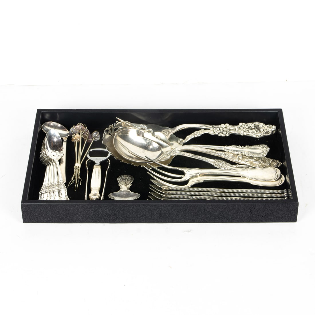 A lot of sterling serving utensils: a Georg Jensen bottle opener; a Reed & Barton macroni server; an (1 of 2)