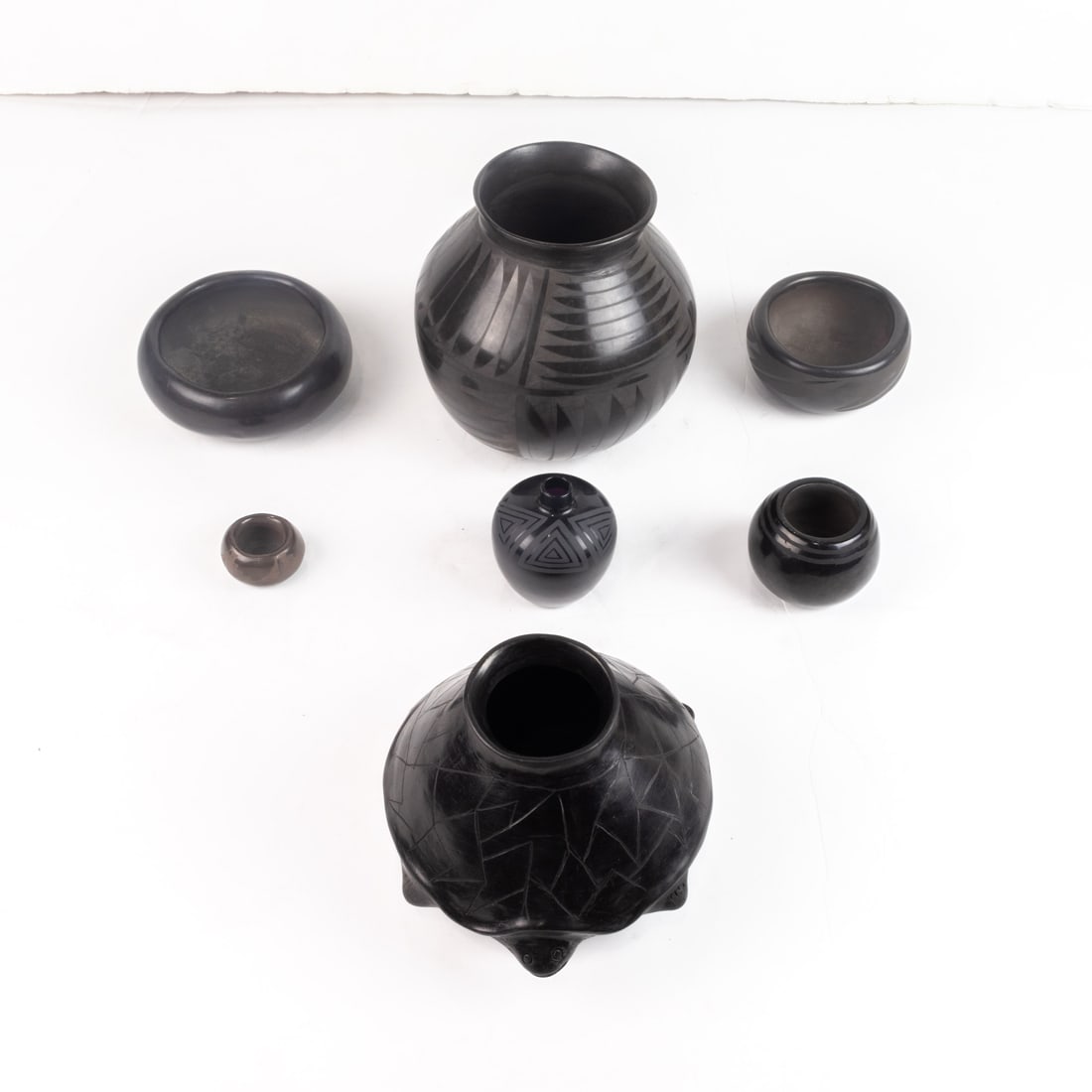 A lot of (7) Santa Clara and Mata Ortiz blackware vessels, most marked or signed, including (1 of 3)