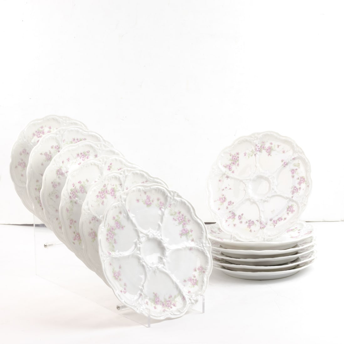 A set of twelve Limoges porcelain oyster plates decorated with floral sprays (1 of 1)
