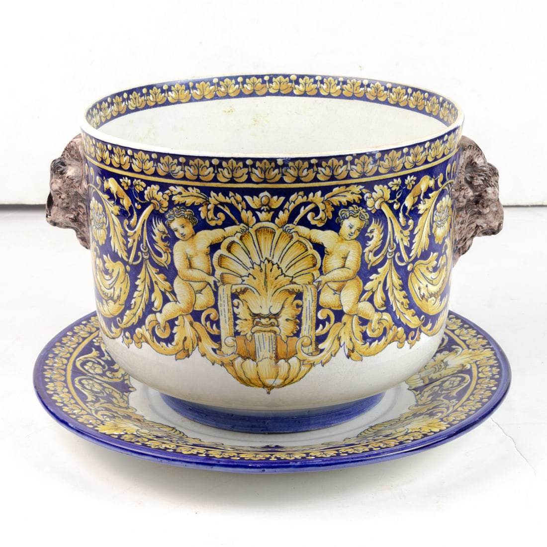 A Gien faience jardiniere and stand painted in the Renaissance style (1 of 3)