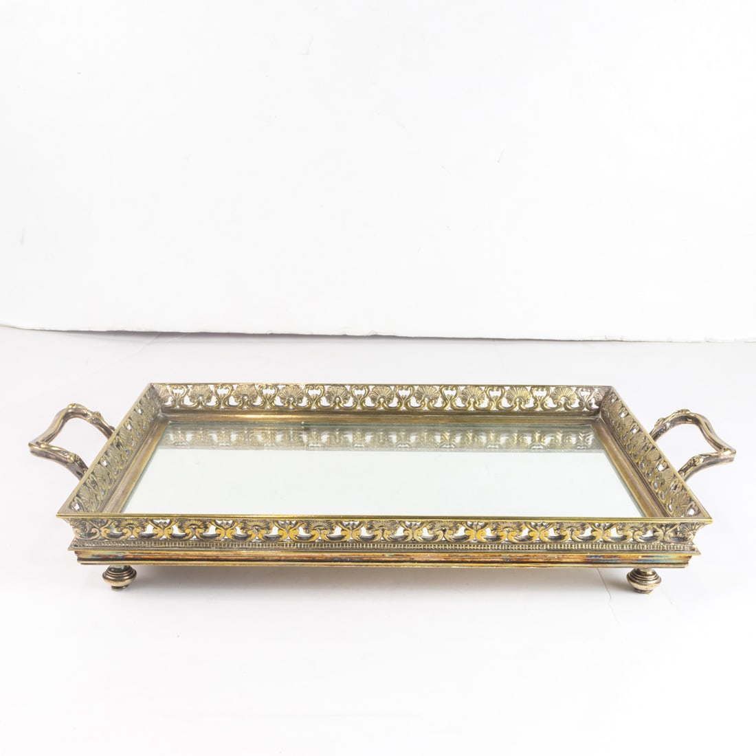 A Neoclassical silver plated bronze mirrored dressing tray (1 of 1)