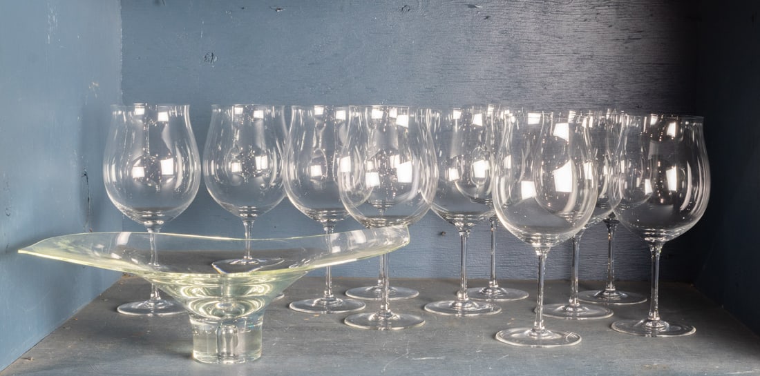 A set of eleven Riedel balloon wine glasses: A set of eleven Riedel balloon wine glasses, together with a center bowl indistinctly signed, [12 total]
