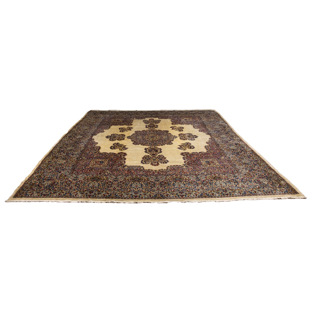 A Persian Kerman carpet: A Persian Kerman carpet